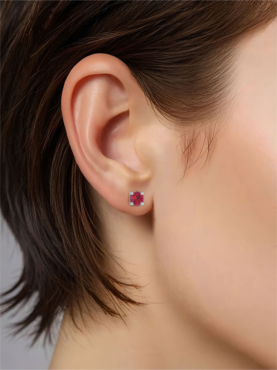 Серьги пусеты из белого золота 585 с рубинами